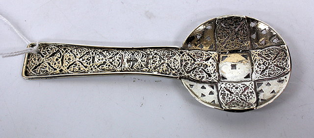 Appraisal: AN EARLY TH CENTURY SILVER CADDY SPOON decorated with Gaelic