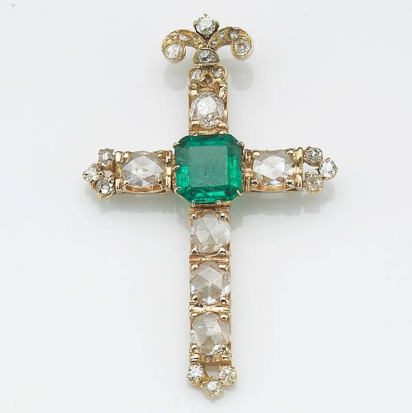 Appraisal: An emerald diamond and k gold cross pendent