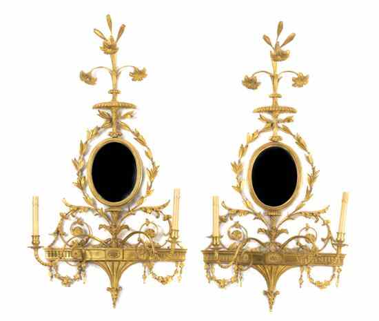 Appraisal: A Pair of Neoclassical Style Gilt Girandole Mirrors modern each