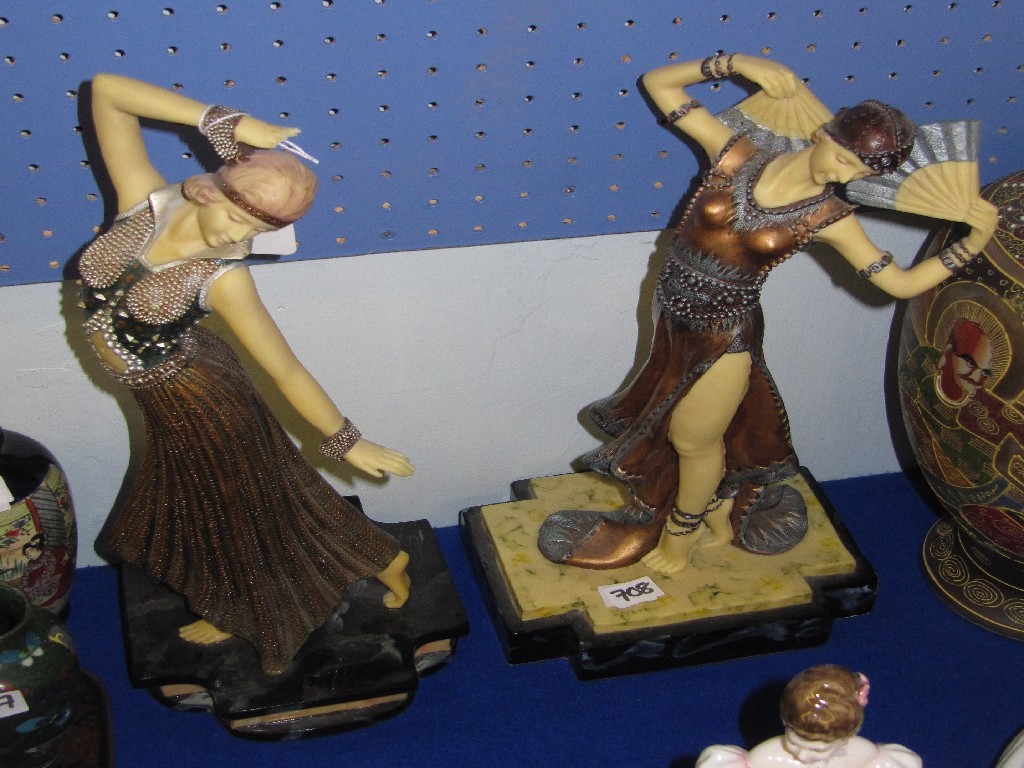 Appraisal: Lot comprising a pair of Art Deco style resin figures