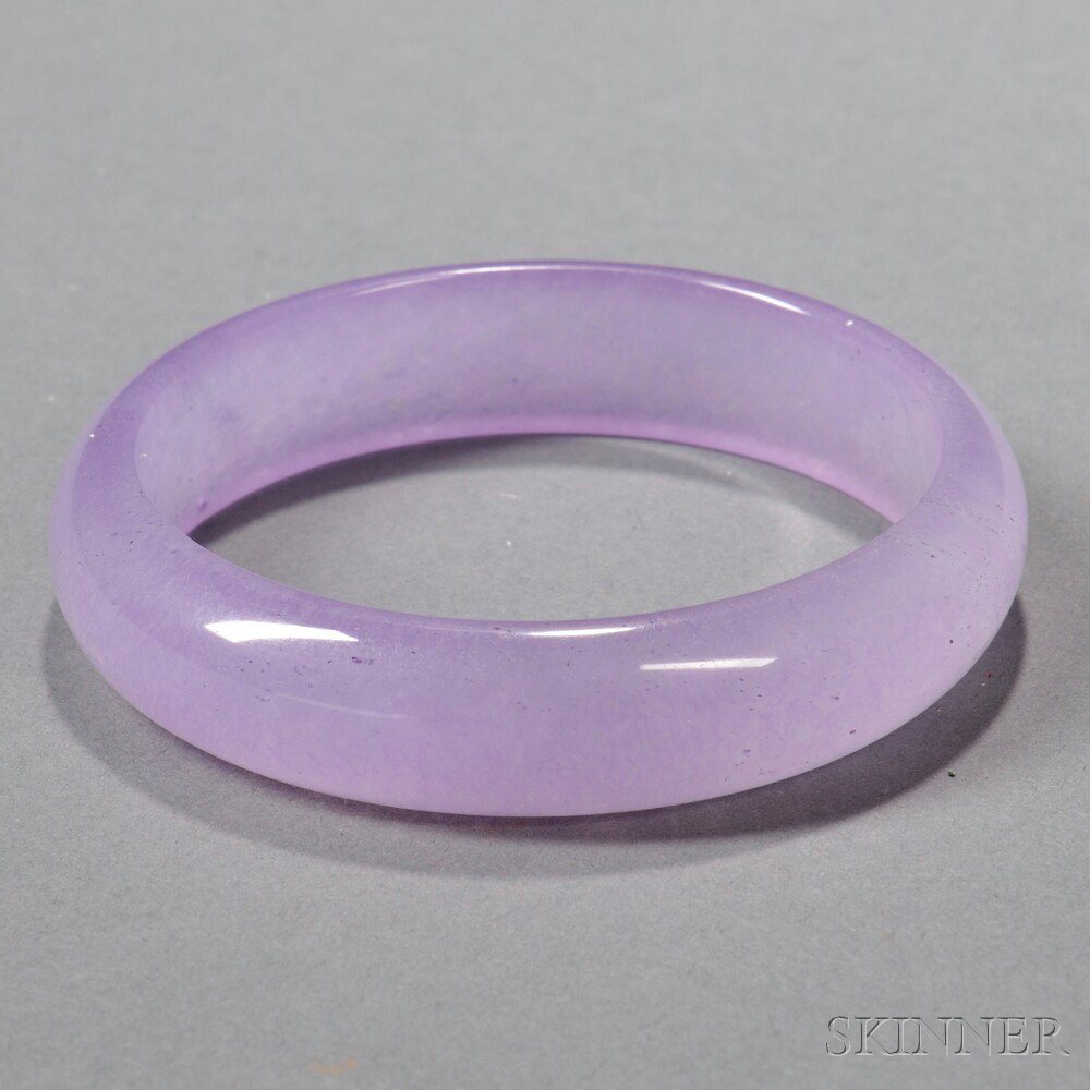 Appraisal: Purple Quartzite Bangle the stone dyed with dark speckles and