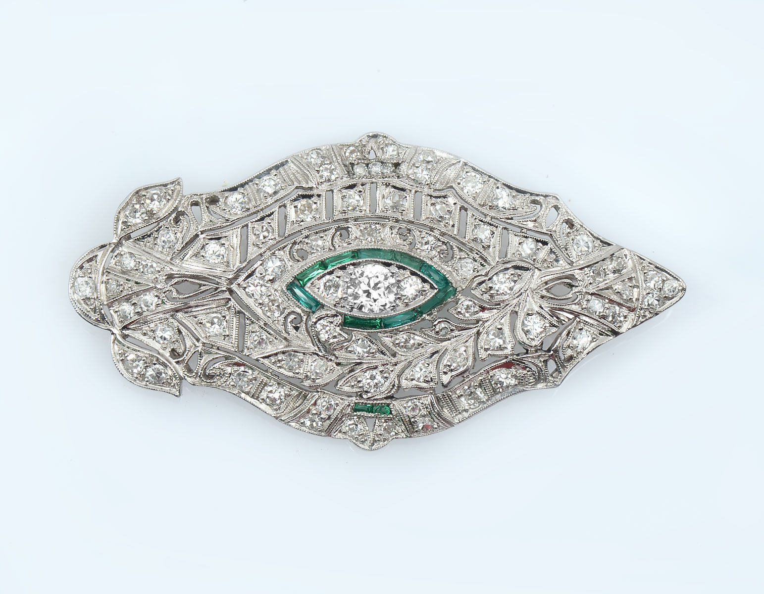 Appraisal: PLATINUM CTW DIAMOND BROOCH Platinum brooch contains one round brilliant