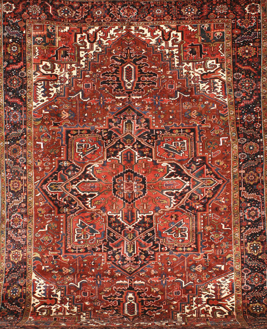 Appraisal: Heriz Rug Post Red ground with herati field centering a