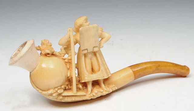 Appraisal: A MEERSCHAUM RISQU PIPE in the form of a maid