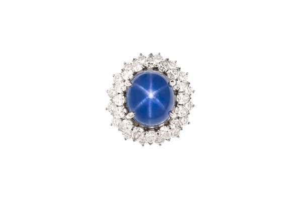 Appraisal: A carat star sapphire diamond platinum ring A star sapphire