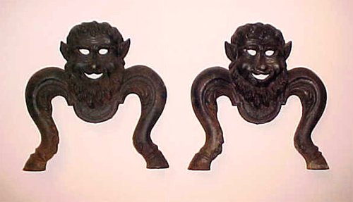 Appraisal: Pair of th Century Cast Iron Satyr Andirons Artist American