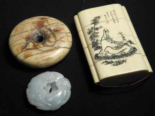 Appraisal: Japanese carved ivory inro and two Japanese carved netsukes Inro