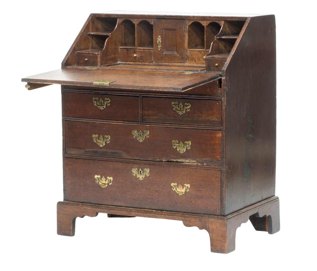 Appraisal: An th century provincial oak bureau the stepped and well