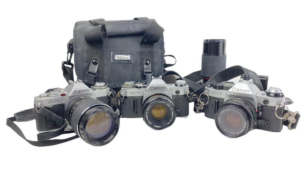 Appraisal: Vintage Cannon Cameras w Case and LensesUntested Lot Includes Everything