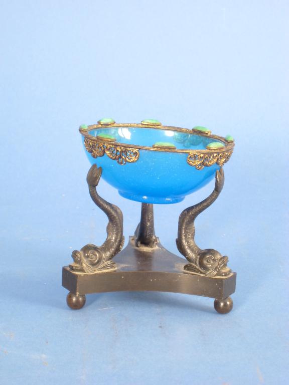 Appraisal: A Regency bronze Stand with three dolphin supports on concave