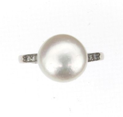 Appraisal: A pearl and diamond ring The pearl measures approximately mm