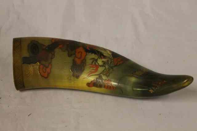 Appraisal: A CHINESE HORN VESSEL painted with dragons and clouds and