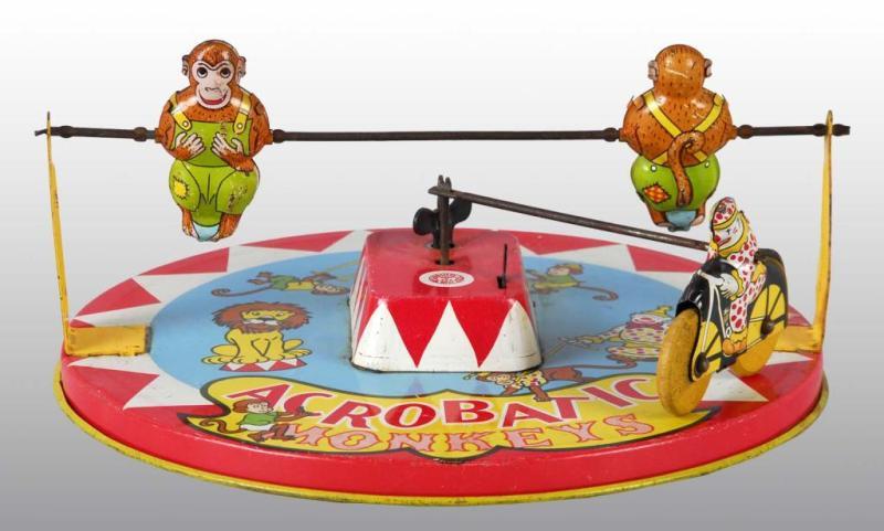 Appraisal: Tin Wyandotte Acrobatic Monkeys Motorcycle Toy Description American Wind-up mechanism