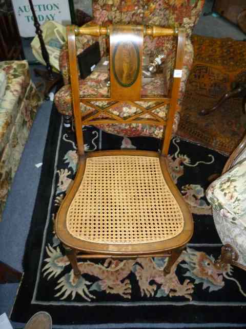 Appraisal: A REGENCY STYLE PAINTED WICKER SEATED SIDE CHAIR the splat