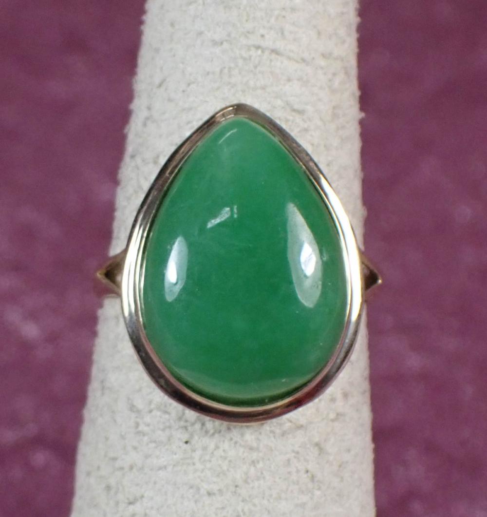 Appraisal: GREEN JADE AND FOURTEEN KARAT GOLD RING The yellow gold