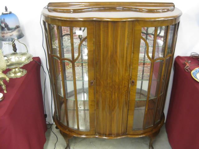 Appraisal: English Deco Curio Cabinet bow front glass shelves wide tall