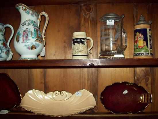 Appraisal: TWO SHELVES OF CHINA CONSISTING OF LUSTRE JUGS MUSICAL BEER