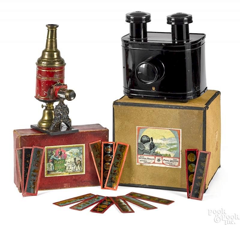 Appraisal: Two German magic lanterns in the original boxes Two German