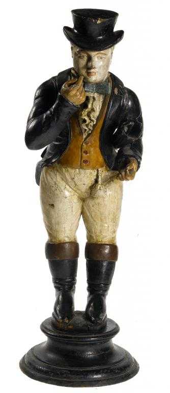 Appraisal: CHARLES DICKENS A CARVED AND PAINTED WOOD STATUETTE OF MR