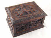 Appraisal: A velvet lined oak casket with lock and key the