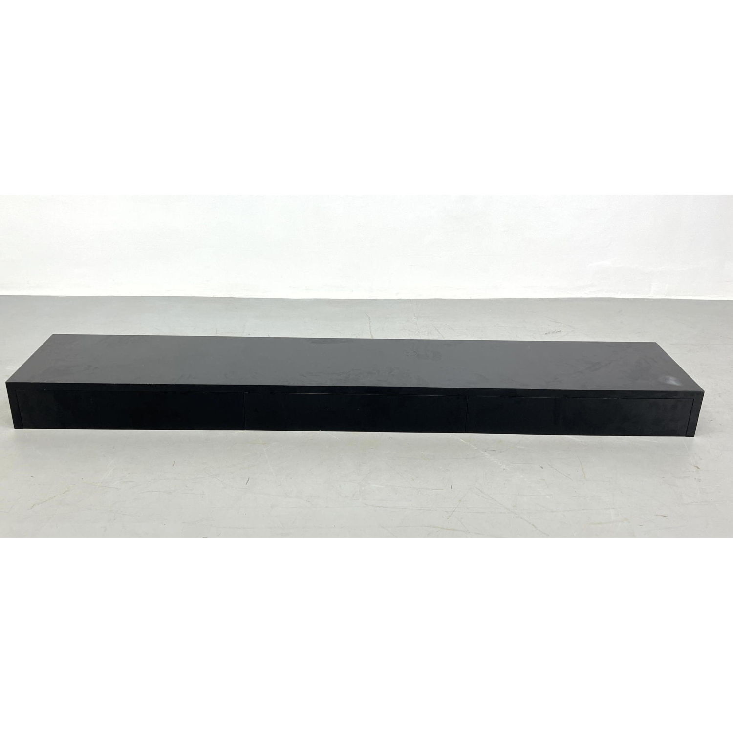 Appraisal: HARVEY PROBBER Long Wall Mount Shelf with Drawers Black finish