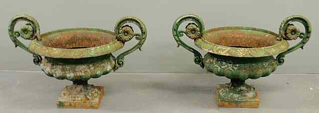 Appraisal: Pair of cast iron Victorian garden urns h x w