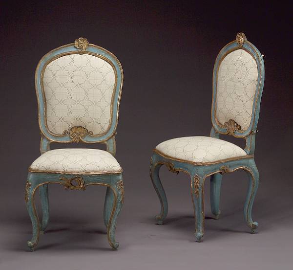 Appraisal: A pair of Venetian Rococo blue painted and parcel gilt