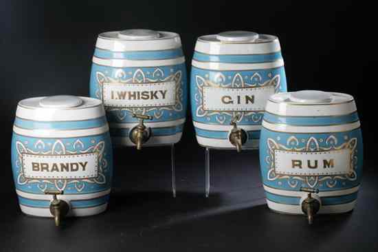 Appraisal: FOUR STAFFORDSHIRE LIQUOR BARRELS AND COVERS th century Including brandy