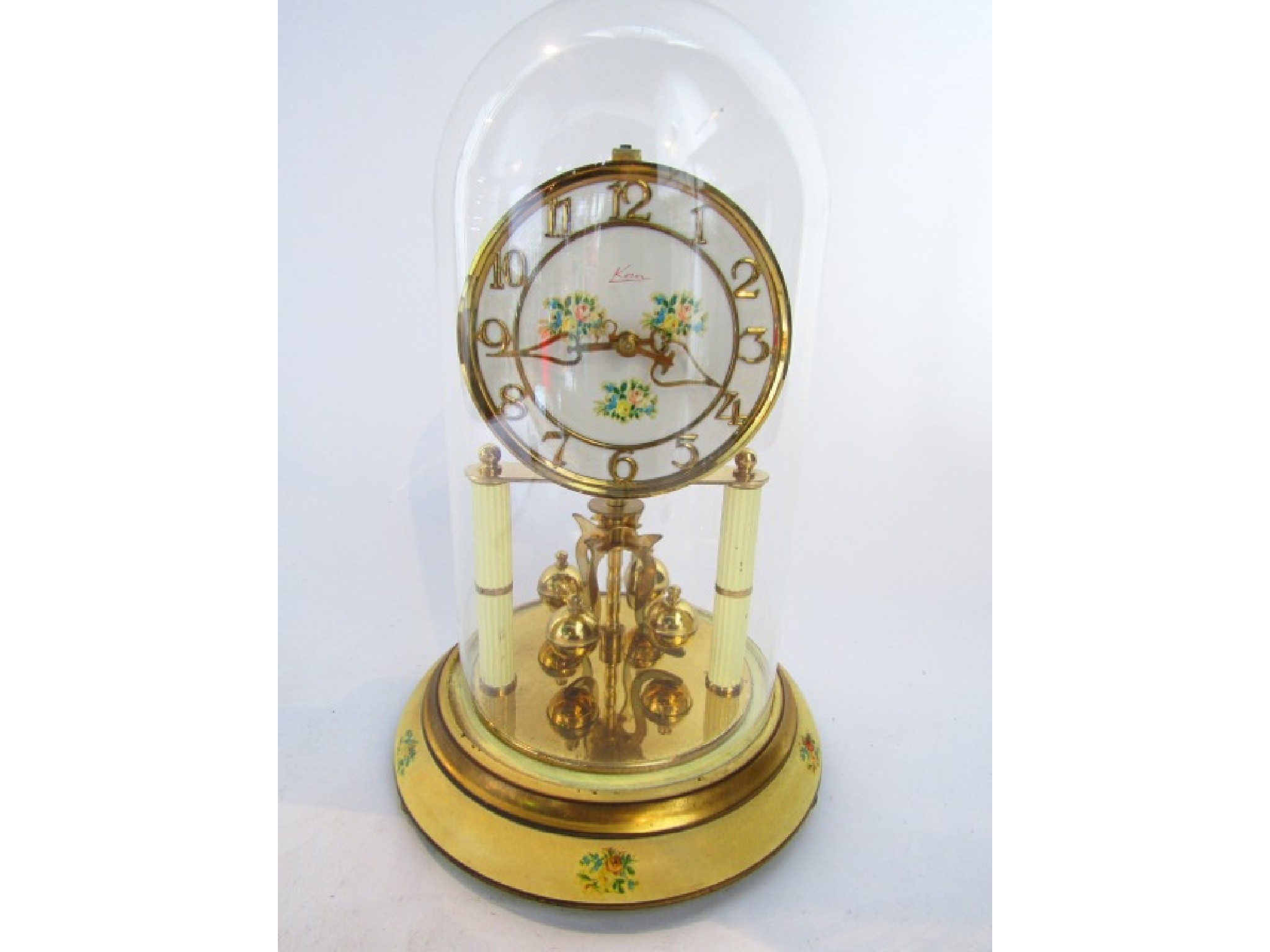 Appraisal: A Kern day or anniversary clock with skeleton movement painted