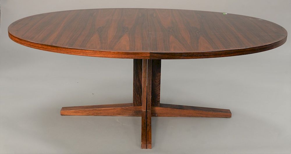 Appraisal: Danish modern oval rosewood table with two leaves in and