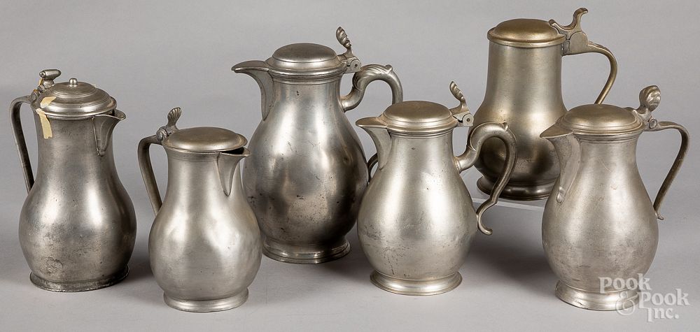 Appraisal: Six Continental pewter pitchers Six Continental pewter pitchers together with