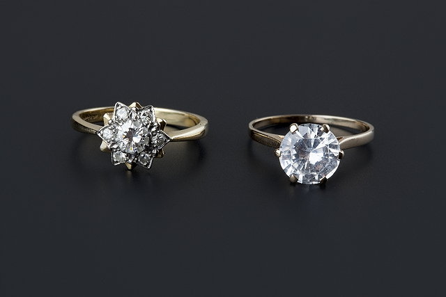 Appraisal: A diamond cluster ring designed as a star-shaped cluster of