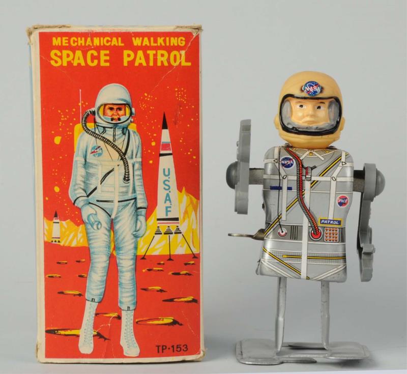 Appraisal: Japanese Mechanical Space Walking Patrol O B Tin litho and