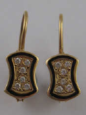 Appraisal: A pair of yellow metal test carat gold diamond and