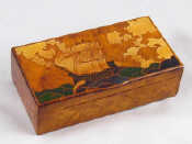 Appraisal: A solid burr walnut box with integral secret box hinge