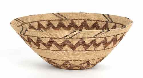 Appraisal: California basketry bowl with zigzag and diamond decoration h dia