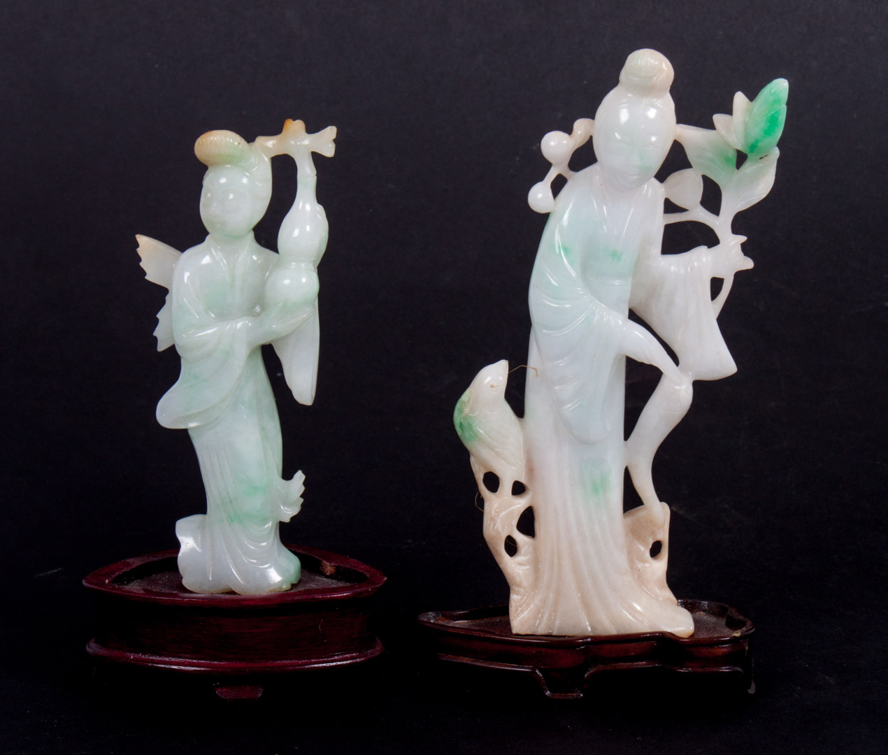 Appraisal: Two Chinese carved jade Quan-Yin figures each modeled as a