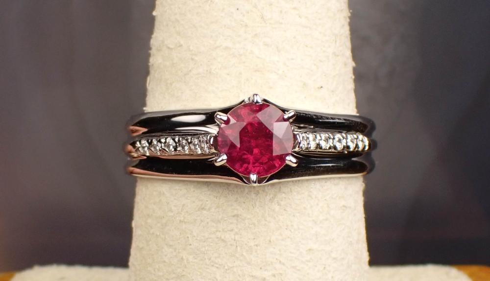 Appraisal: RUBY DIAMOND AND FOURTEEN KARAT WHITE GOLD RING with six