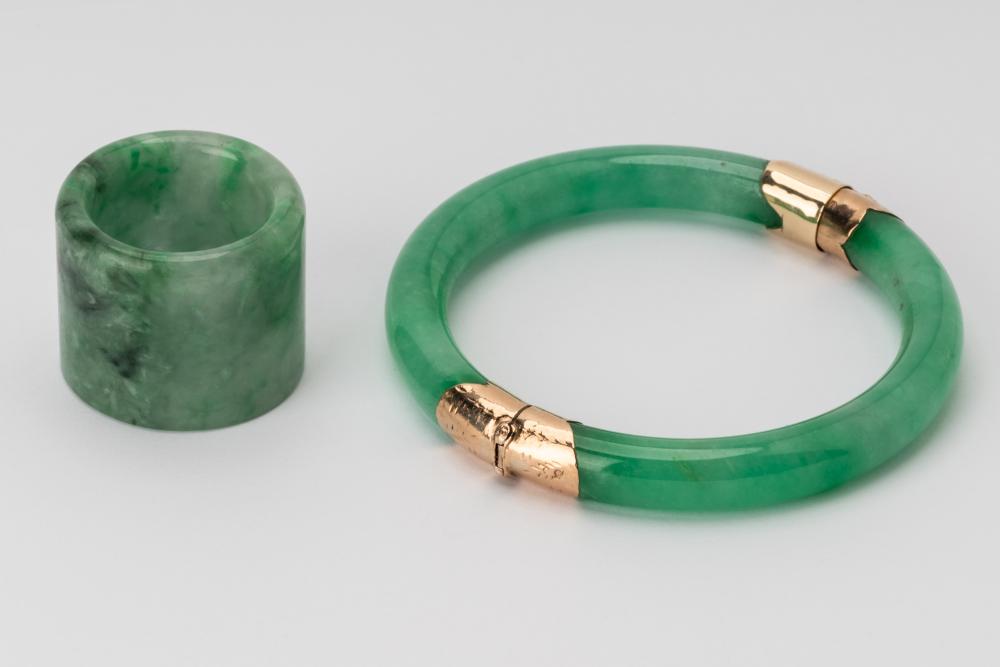 Appraisal: ONE JADE BANGLE JADE ARCHERS RINGIncluding a karat yellow gold