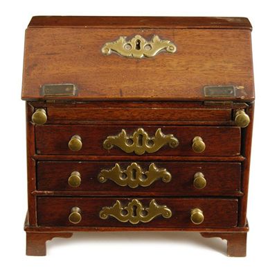 Appraisal: A th century mahogany miniature bureau the fall with later