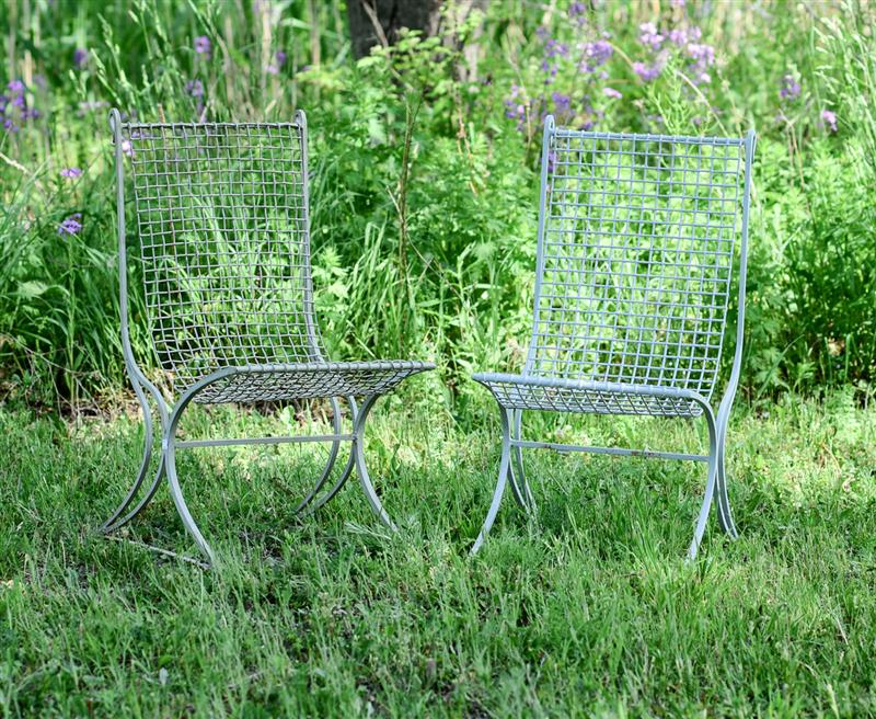 Appraisal: NEAR PAIR OF FRENCH PAINTED METAL GARDEN SLIPPER CHAIRS Each