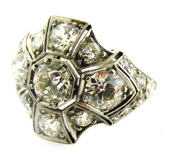 Appraisal: JEWELRY Platinum Art Deco diamond ring with octagonal design center