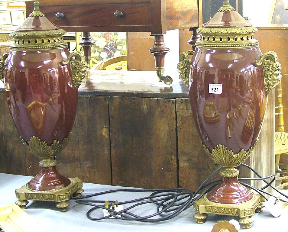 Appraisal: Pair of contemporary burgundy Empire style porcelain and gilt metal