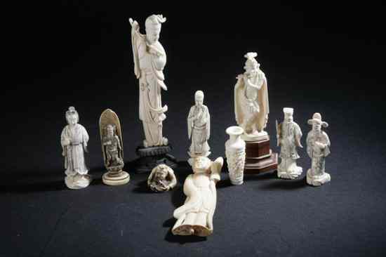 Appraisal: EIGHT CHINESE IVORY CARVINGS Seven figural carvings one small vase