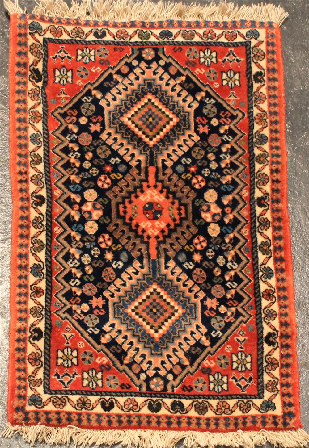 Appraisal: THREE SMALL PERSIAN RUGS INCLUDING TWO SHIRAZ AND A SAROUK