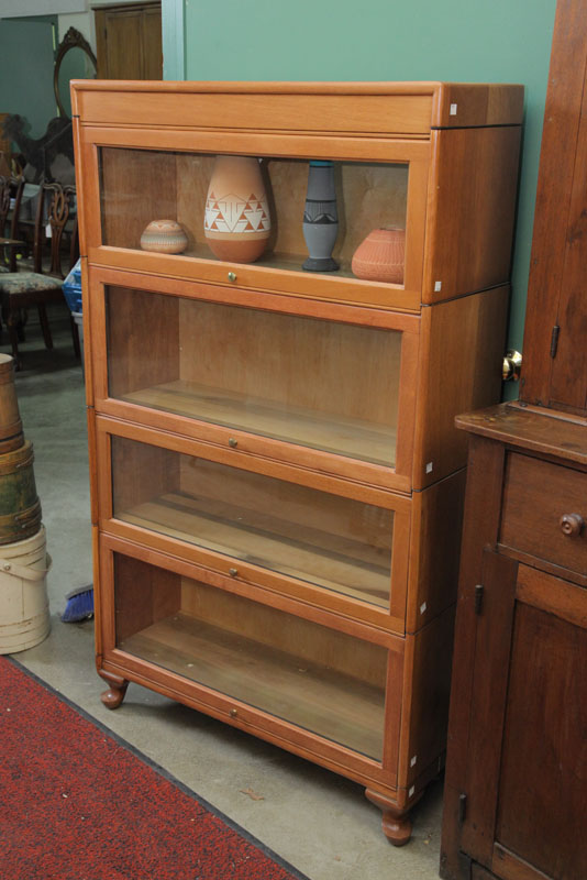 Appraisal: GRAND RAPIDS STACKED BOOKCASE Mixed woods consisting of four stacks