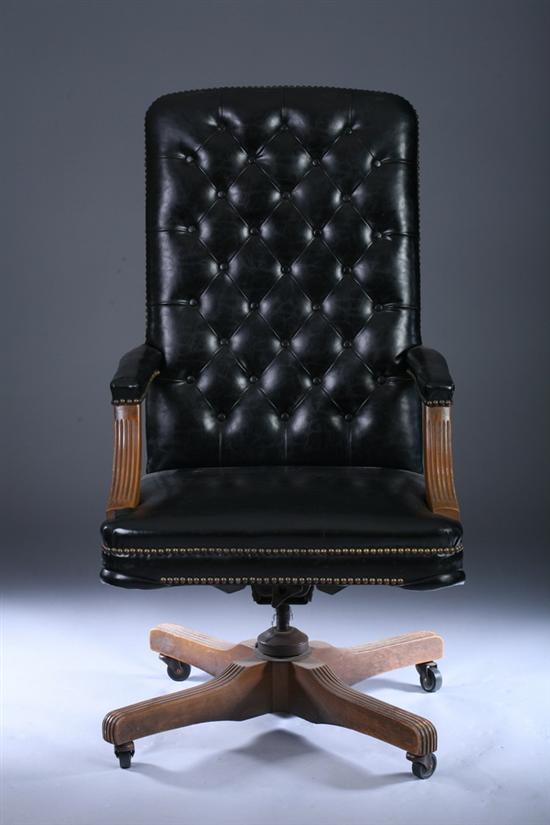 Appraisal: JEANE DIXON'S BLACK TUFTED-LEATHER OPEN-ARM SWIVEL-BASE EXECUTIVE DESK CHAIR With