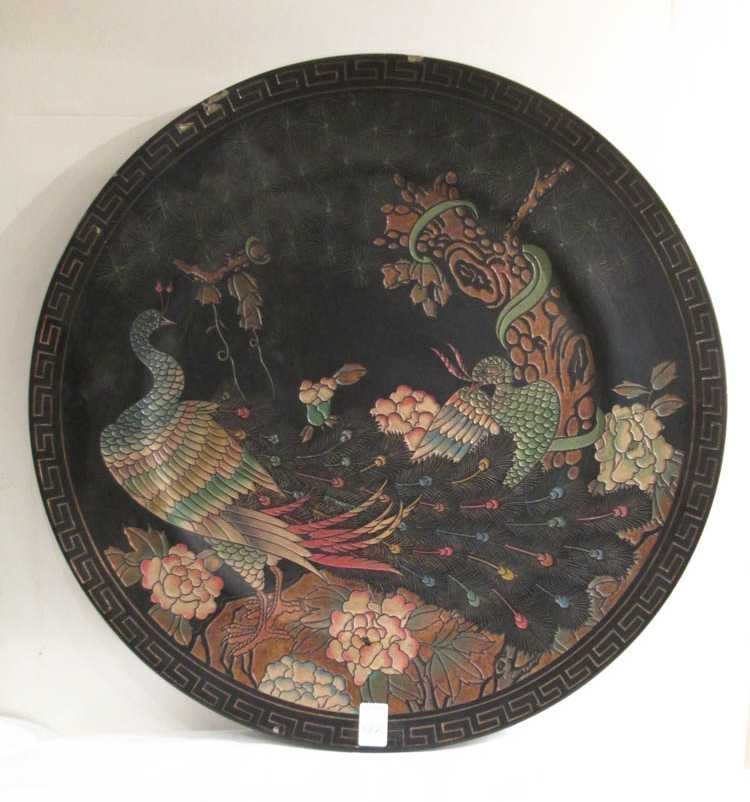 Appraisal: ROUND COROMANDEL WALL PLAQUE Chinese th century featuring carved floral