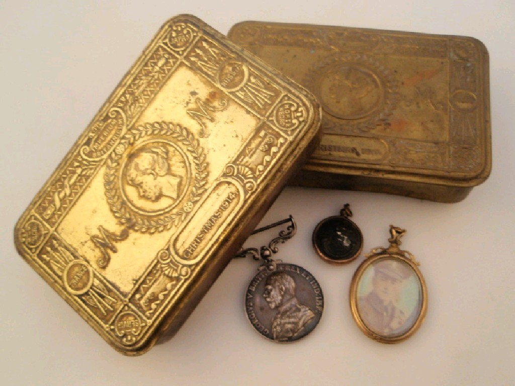 Appraisal: Two WWI Christmas tins two lockets and a meritorious service