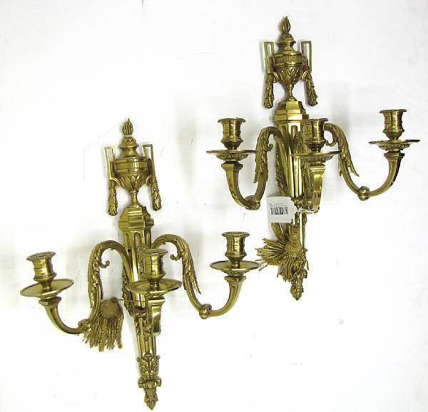 Appraisal: A pair of Louis XVI style gilt bronze three light